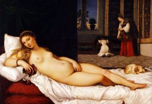 Pintura renacentista de una mujer desnuda recostada en una cama, con un perrito a sus pies y dos doncellas al fondo, obra de Tiziano titulada "La Venus de Urbino", realizada en 1530.